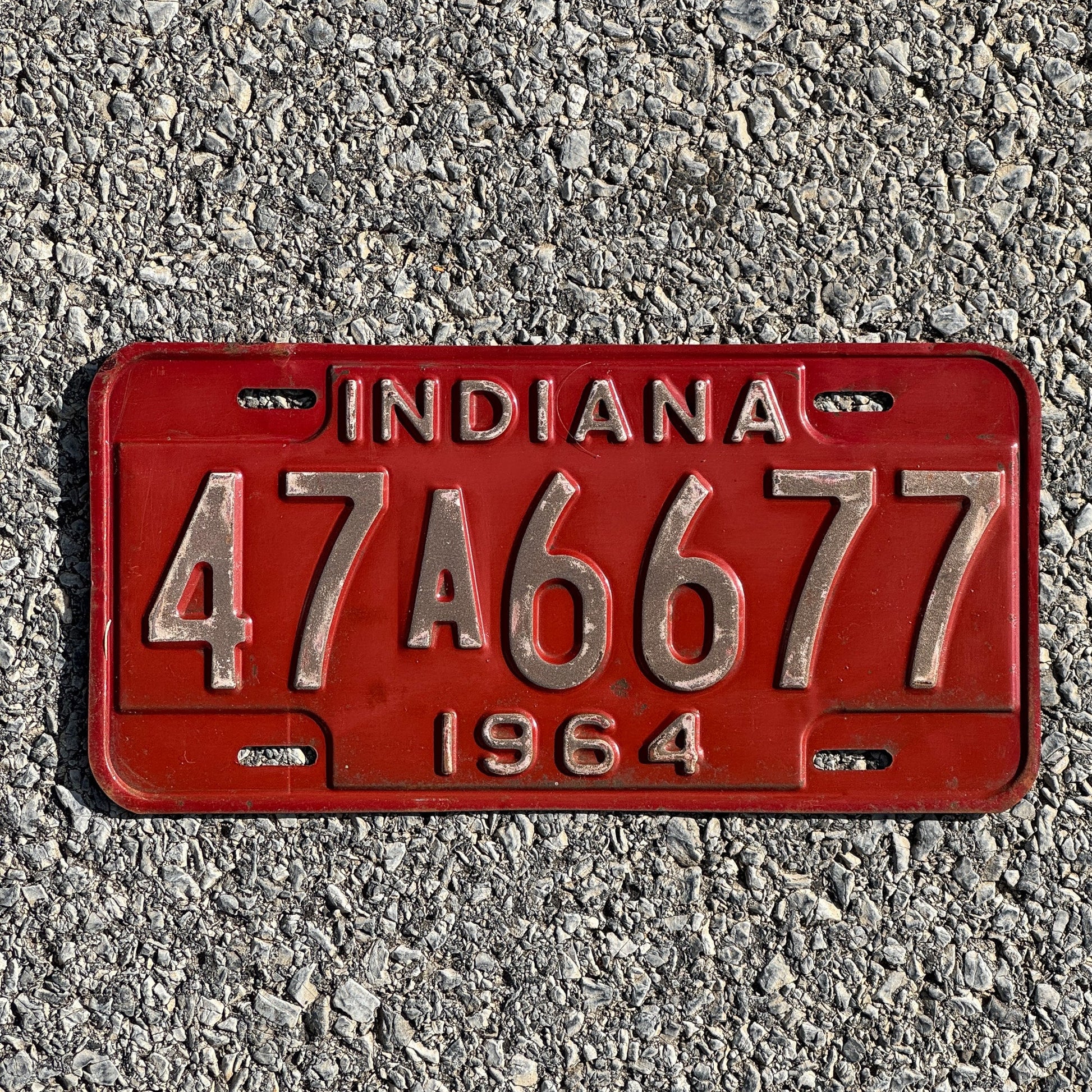 Photo of a 1964 Indiana License Plate Auto Tag Garage Decor Vintage 47A6677
