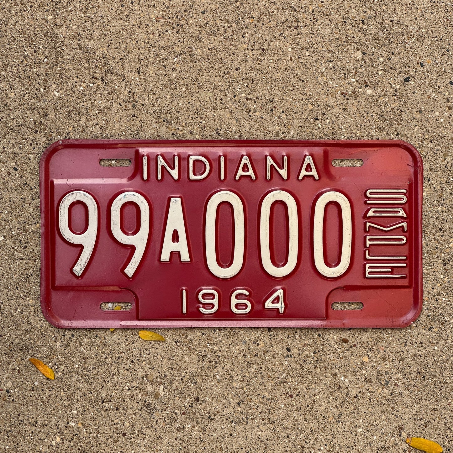 Photo of a 1964 Indiana Sample License Plate Auto Tag 1 Garage Decor 99A000 with original patina
