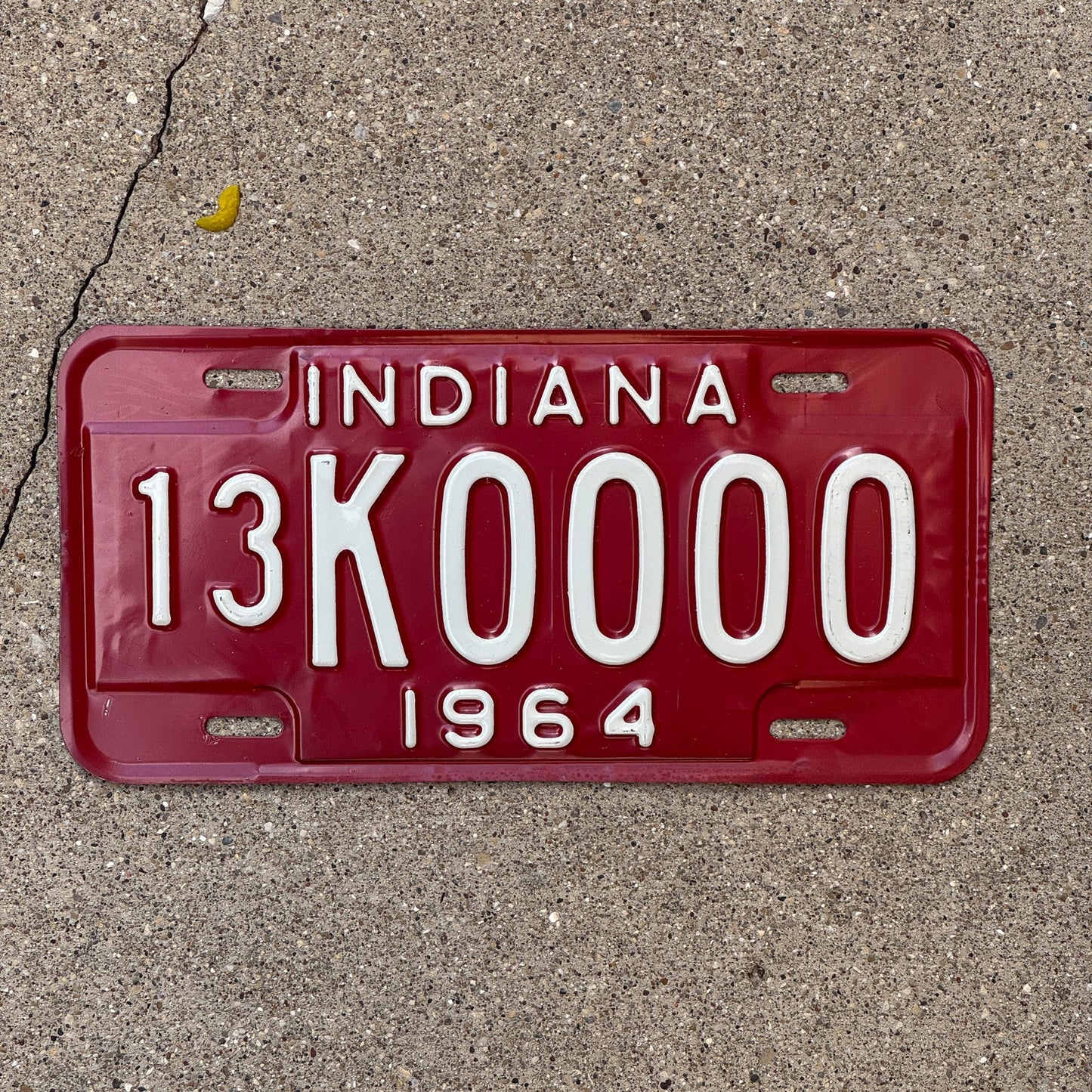 Photo of a 1964 Indiana Sample License Plate Auto Tag Garage Decor Vintage Oddball Crawford County 13 13K0000 with original patina
