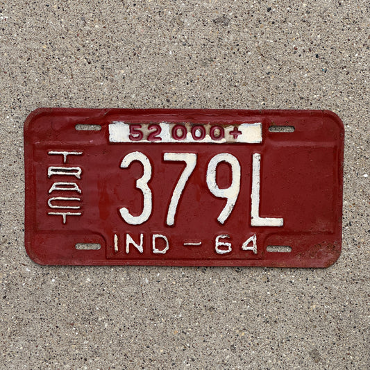Photo of a 1964 Indiana Tractor License Plate Auto Tag Garage Decor Vintage 379 L with original patina
