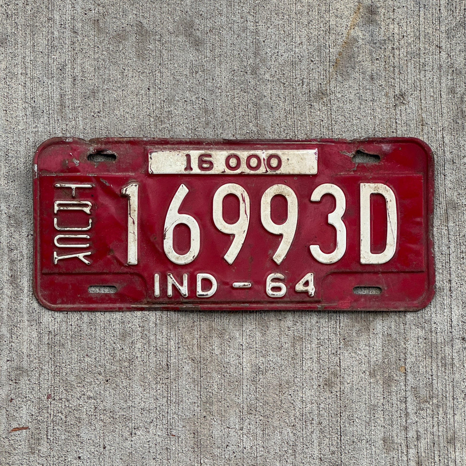 Photo of a 1964 Indiana Truck License Plate Auto Tag Garage Decor Vintage 16993 D with original patina
