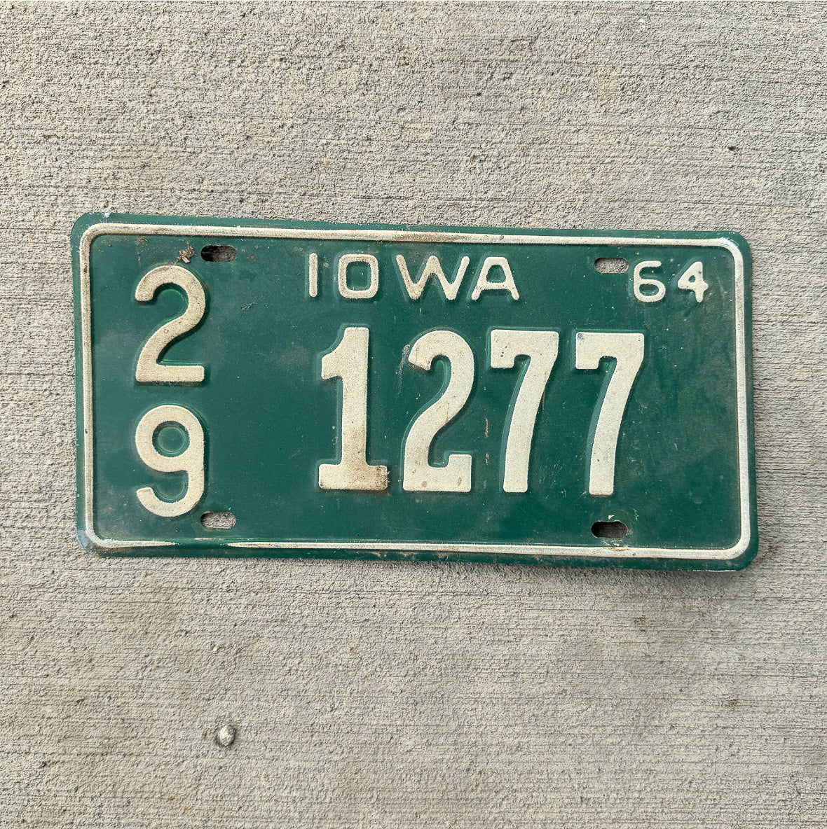 Photo of a 1964 Iowa License Plate Auto Tag Garage Decor Vintage 29 1277 with original patina