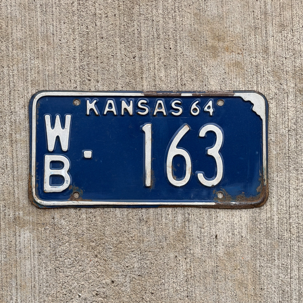 Photo of a 1964 Kansas License Plate Auto Tag Garage Decor Vintage WB 163 with original patina