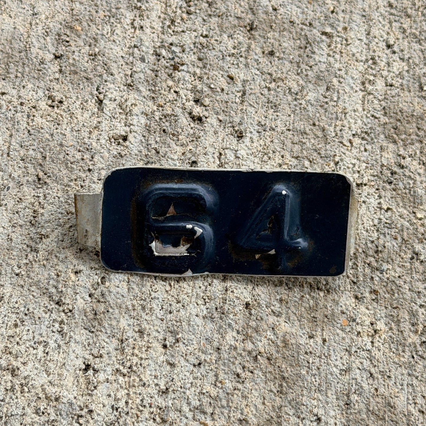 Photo of a 1964 Maine Tab License Plate Auto Tag Garage Decor Vintage with original patina