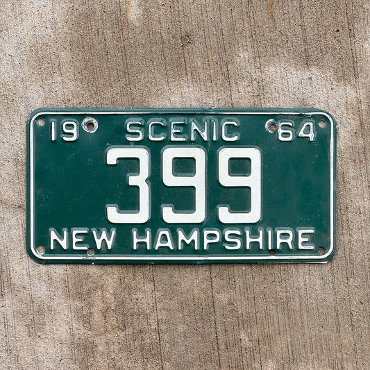 Photo of a 1964 New Hampshire License Plate Auto Tag 2 Vintage Garage Low Number Three Digit 399 with original patina