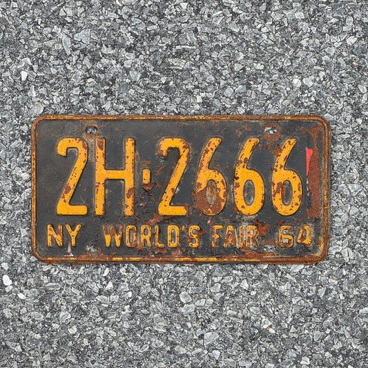 Photo of a 1964 New York License Plate Auto Tag Garage Decor Vintage 666 Devil Evil Repeat Repeating 2H 2666