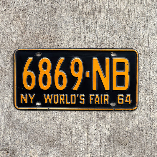 Photo of a 1964 New York License Plate Auto Tag Garage Decor Vintage DMV Clear Single Plate Year 6869 NB with original patina
