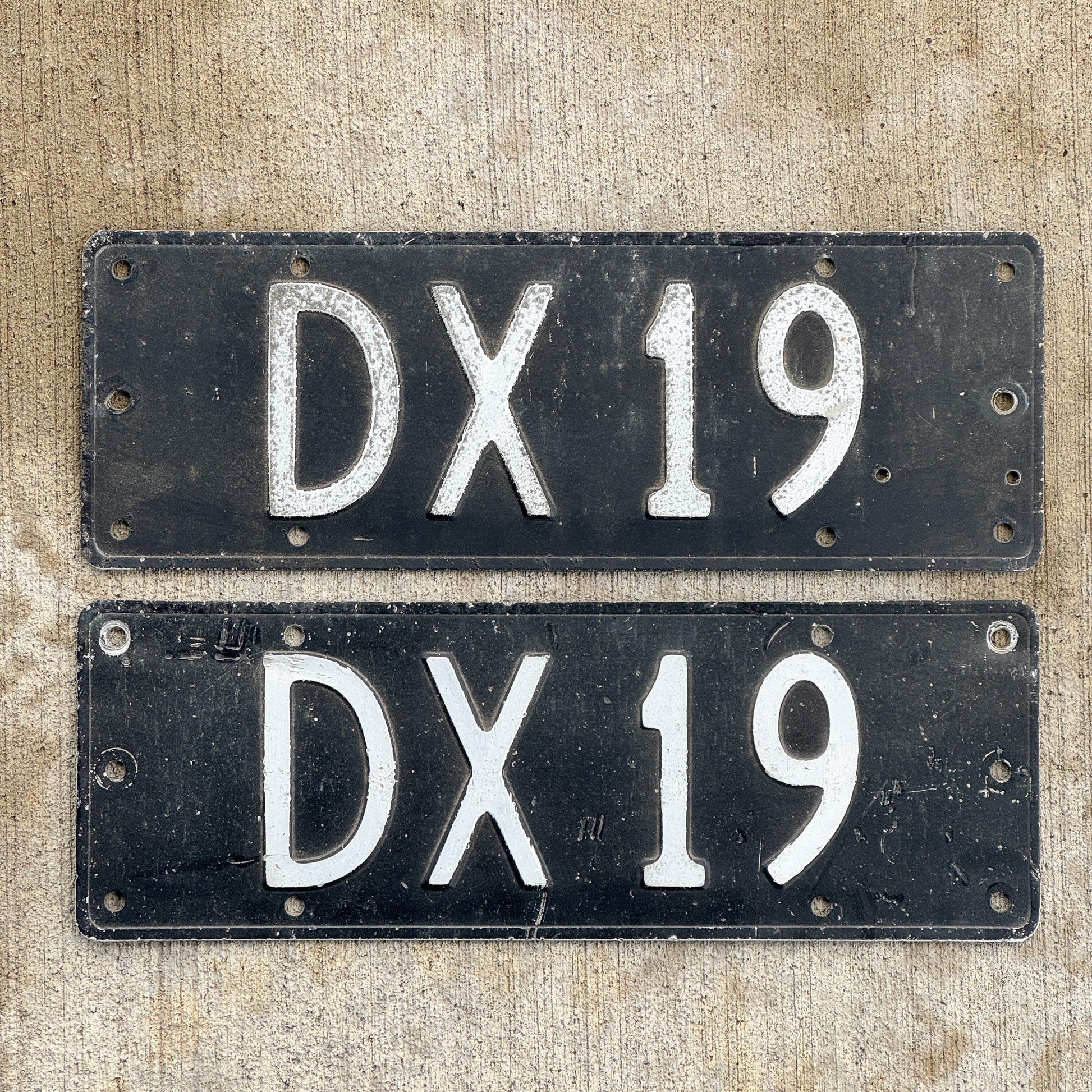 Photo of a 1964 New Zealand License Plate Pair Auto Tag Garage Decor Vintage DX 19 with original patina