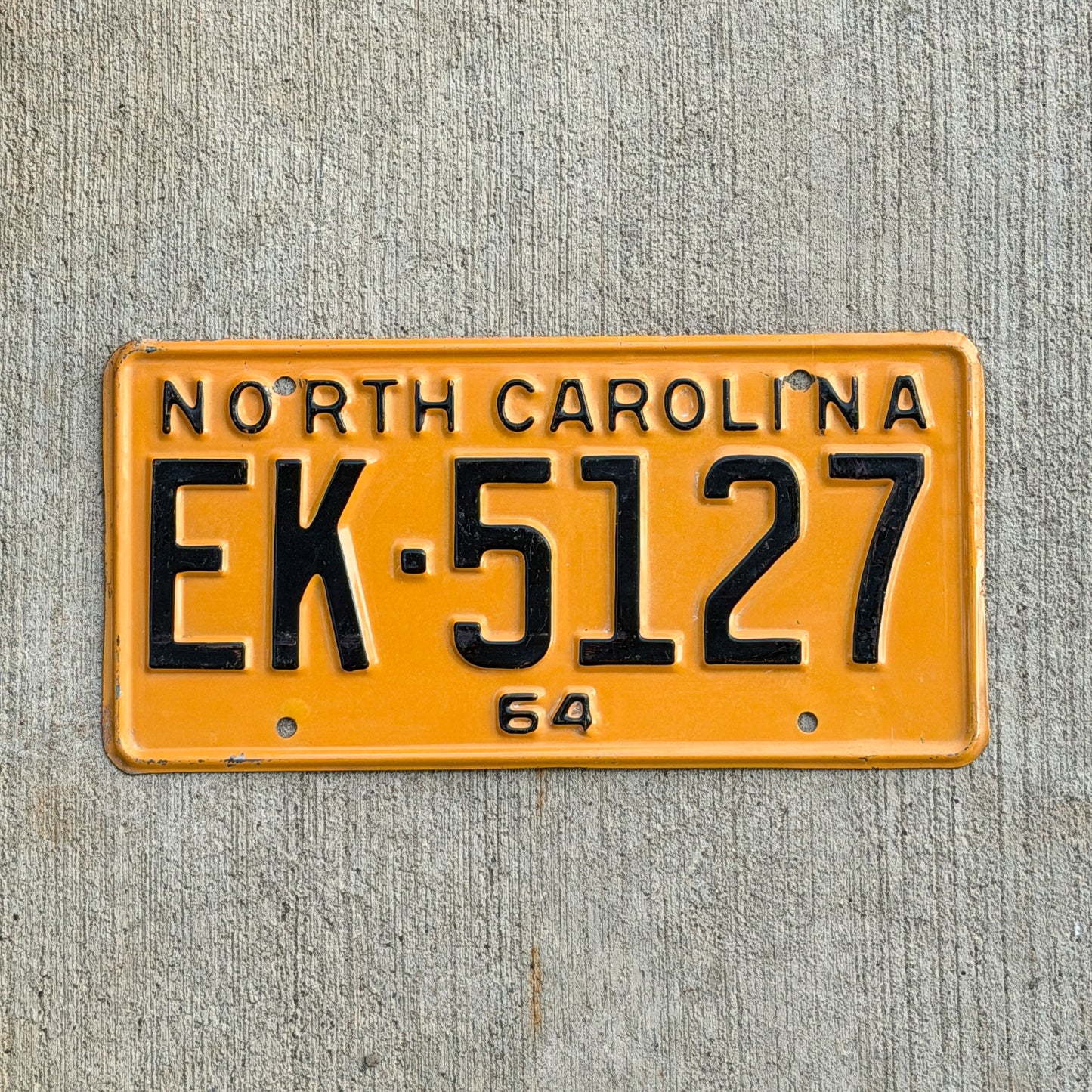 Photo of a 1964 North Carolina License Plate Auto Tag Garage Decor Vintage High Quality EK 5127 with original patina