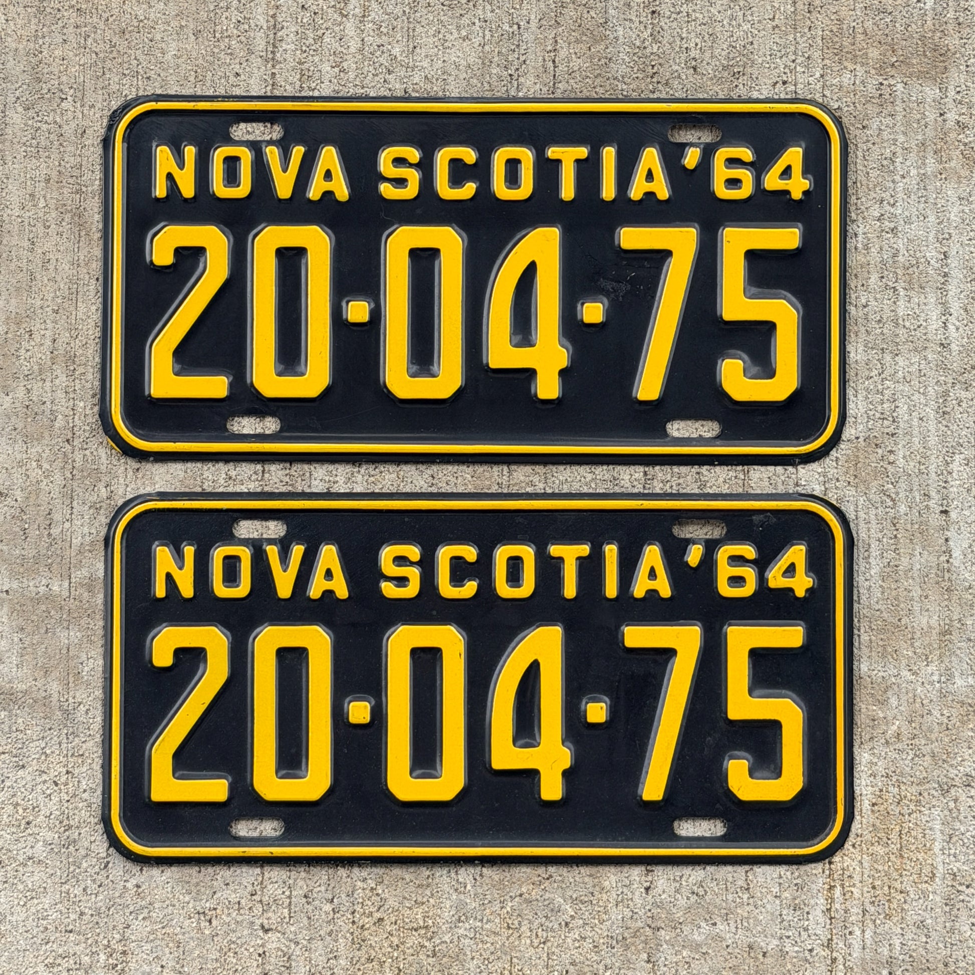 Photo of a 1964 Nova Scotia License Plate Pair Auto Tag Garage Decor Vintage 20 04 75 with original patina