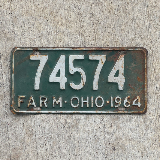 Photo of a 1964 Ohio Farm License Plate Auto Tag Garage Decor Vintage 74574 with original patina