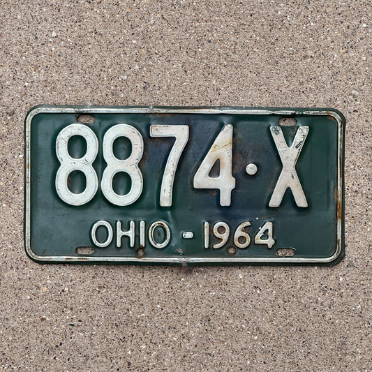 Photo of a 1964 Ohio License Plate Auto Tag Garage Decor Vintage 8874 X with original patina