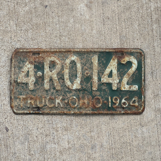 Photo of a 1964 Ohio Truck License Plate Auto Tag Garage Decor Vintage 4 RQ 142 with original patina