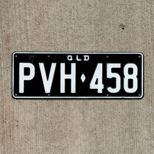 Photo of a 1964 Queensland Australia License Plate Auto Tag Garage Decor Vintage PVH 458 with original patina