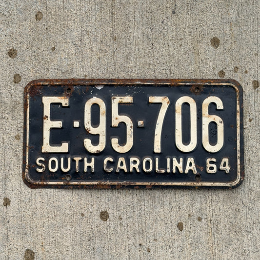 Photo of a 1964 South Carolina License Plate Auto Tag Garage Decor Vintage E 95 706 with original patina