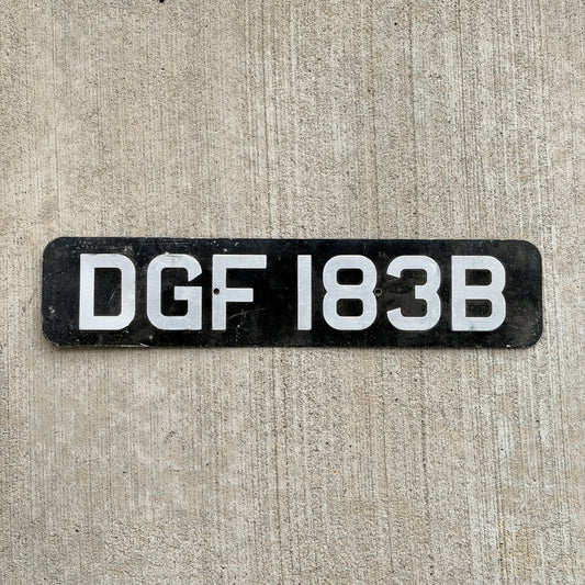 Photo of a 1964 United Kingdom License Plate Auto Tag Garage Decor Vintage UK England DGF 183 B with original patina