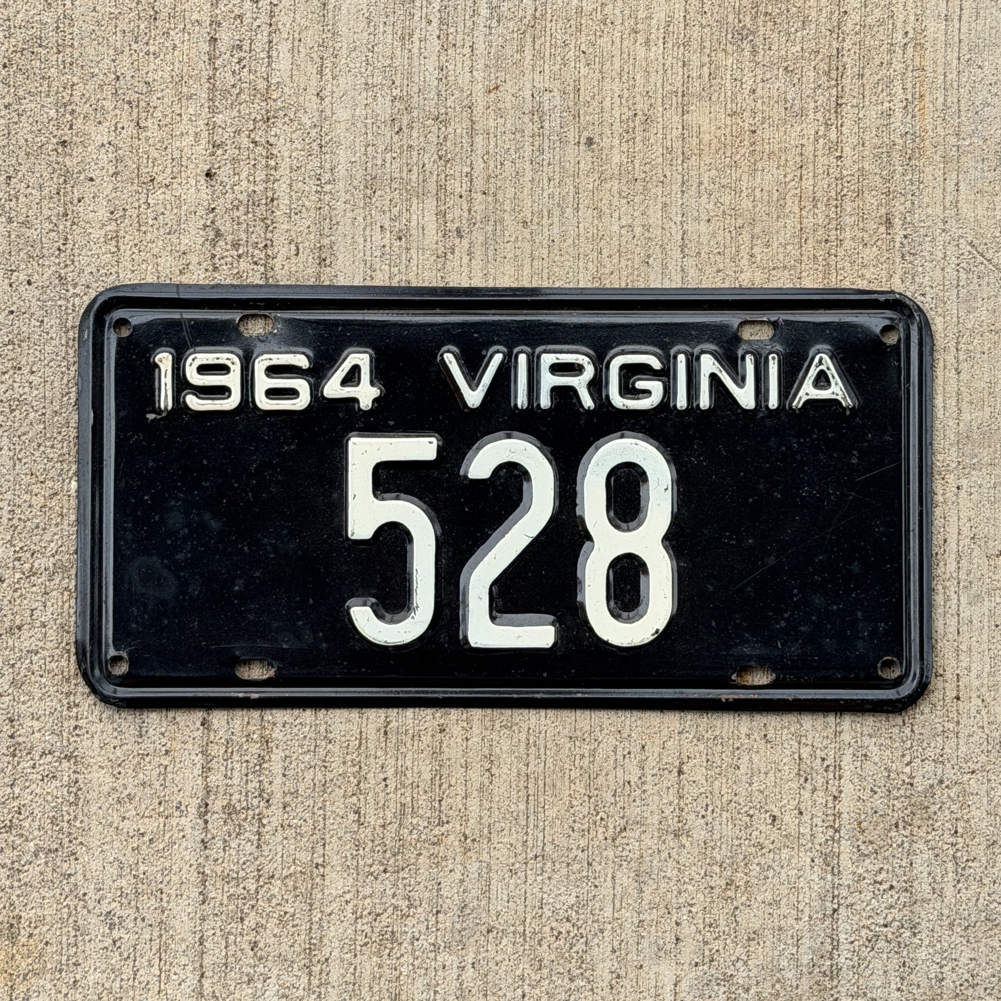 Photo of a 1964 Virginia License Plate Auto Tag Garage Decor Vintage Low Number Three Digit 528 with original patina