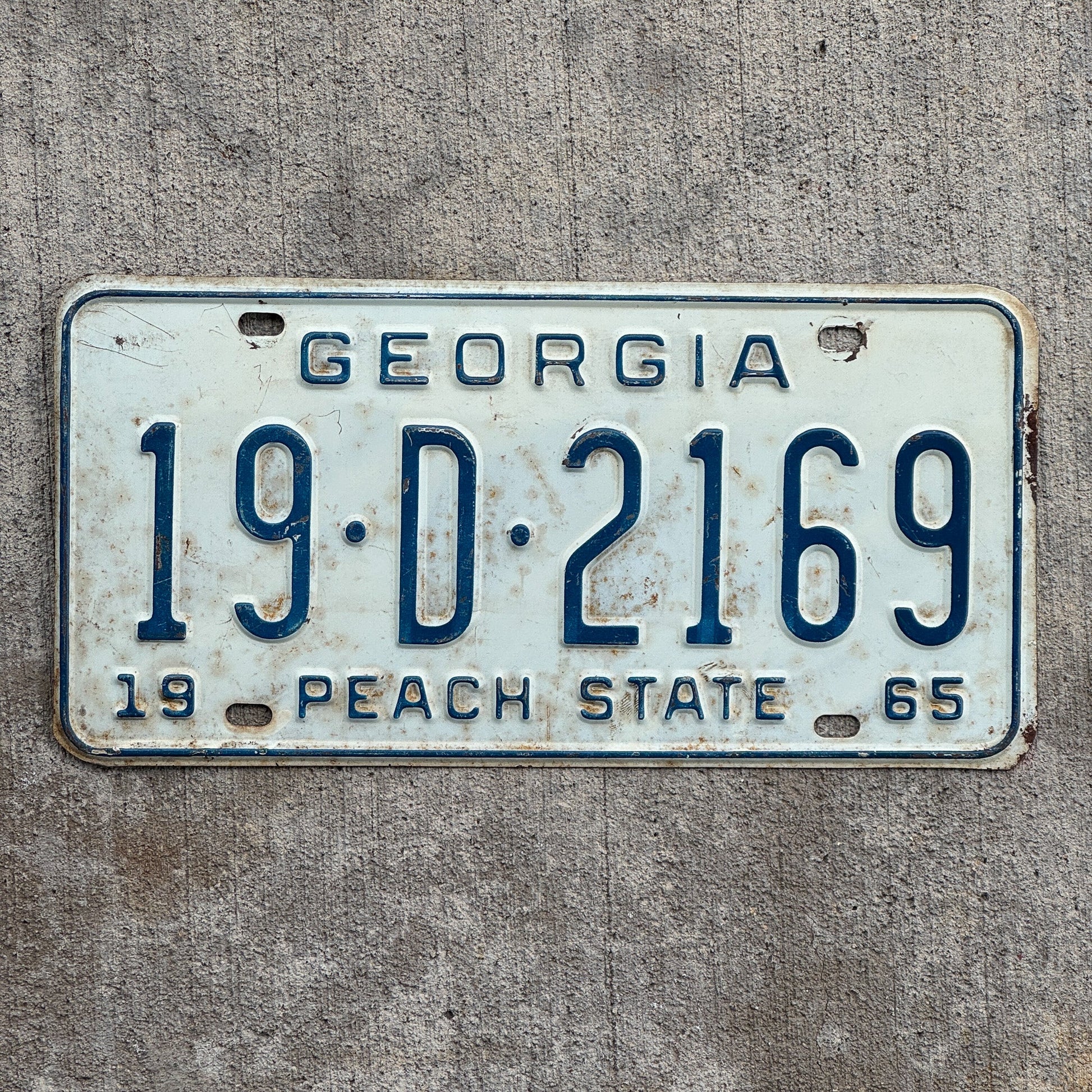 Photo of a 1965 Georgia License Plate Auto Tag Garage Decor Vintage 19 D 2169 with original patina