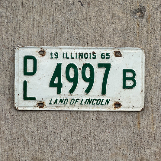Photo of a 1965 Illinois Dealer License Plate Auto Tag 1 Vintage Garage 4997 B with original patina