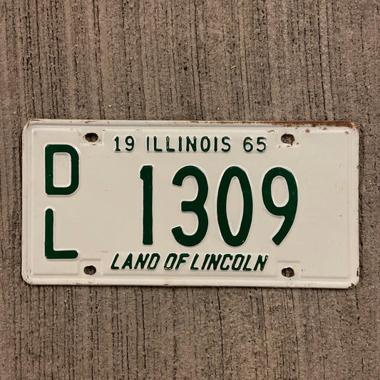 Photo of a 1965 Illinois Dealer License Plate Auto Tag Garage Decor Vintage 1309 with original patina