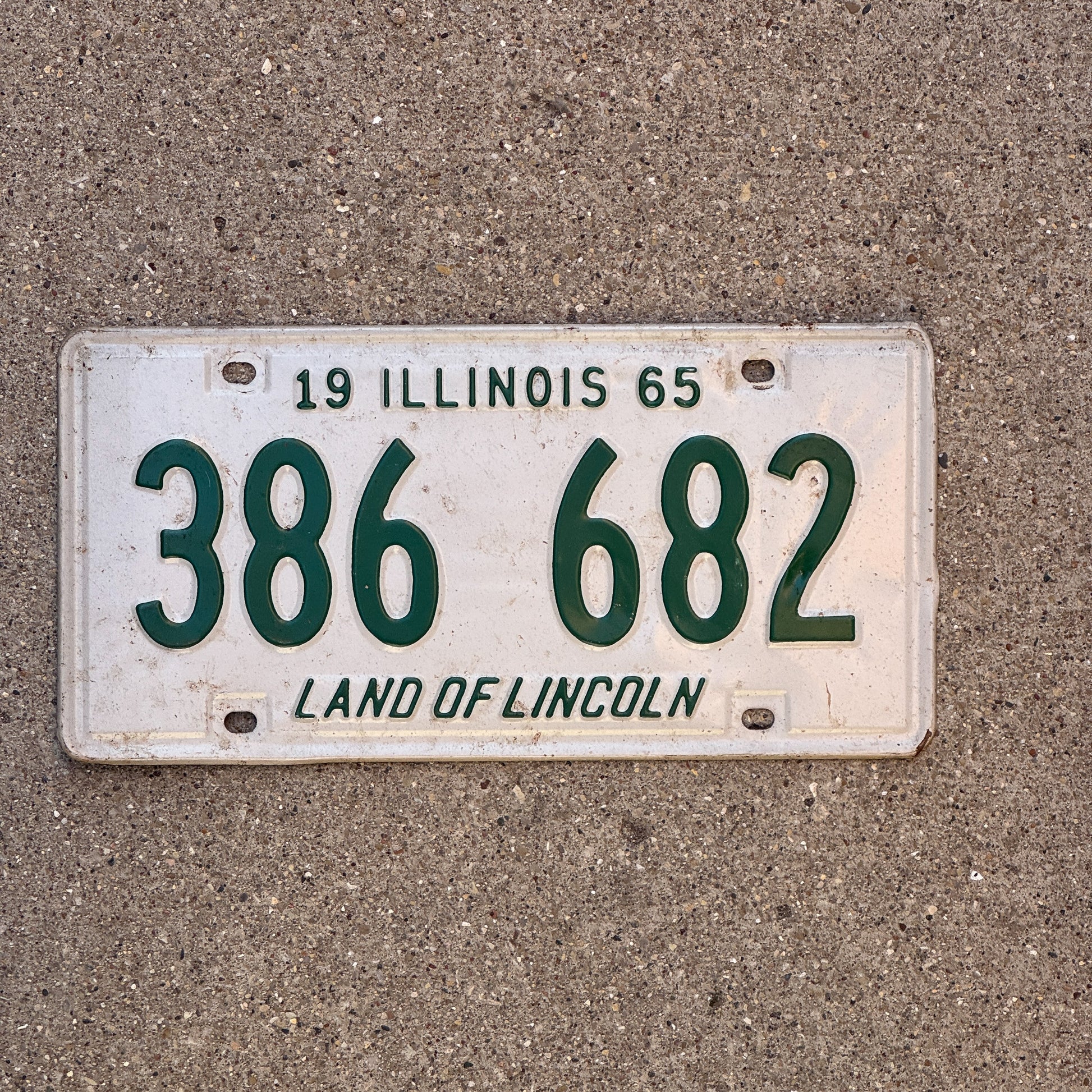 Photo of a 1965 Illinois License Plate Auto Tag 2 Vintage Garage 386 682 with original patina