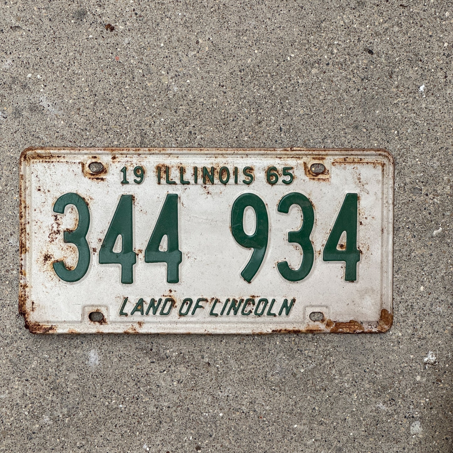 Photo of a 1965 Illinois License Plate Auto Tag Garage Decor Vintage 344 934 with original patina