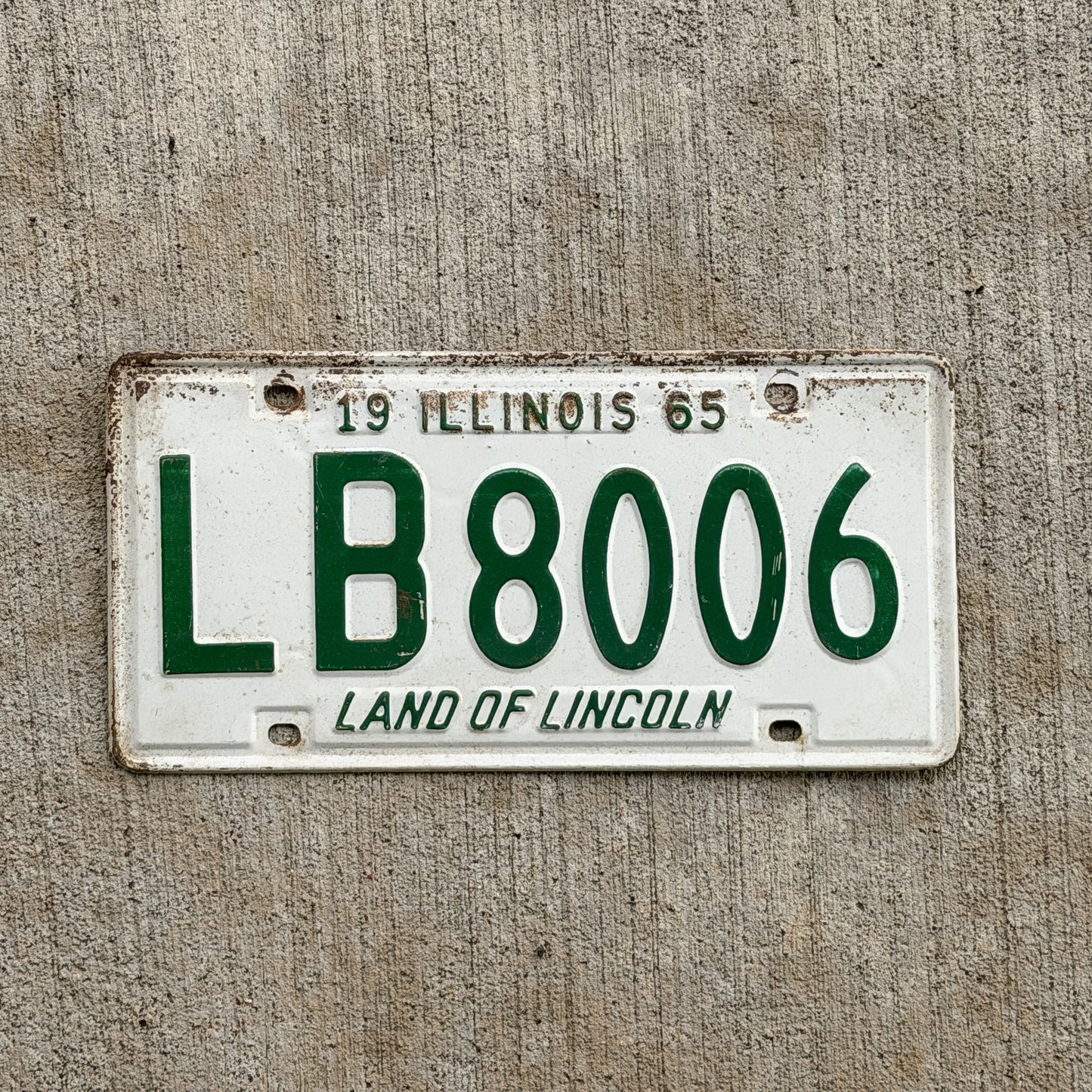 Photo of a 1965 Illinois License Plate Auto Tag Garage Decor Vintage LB 8006 with original patina