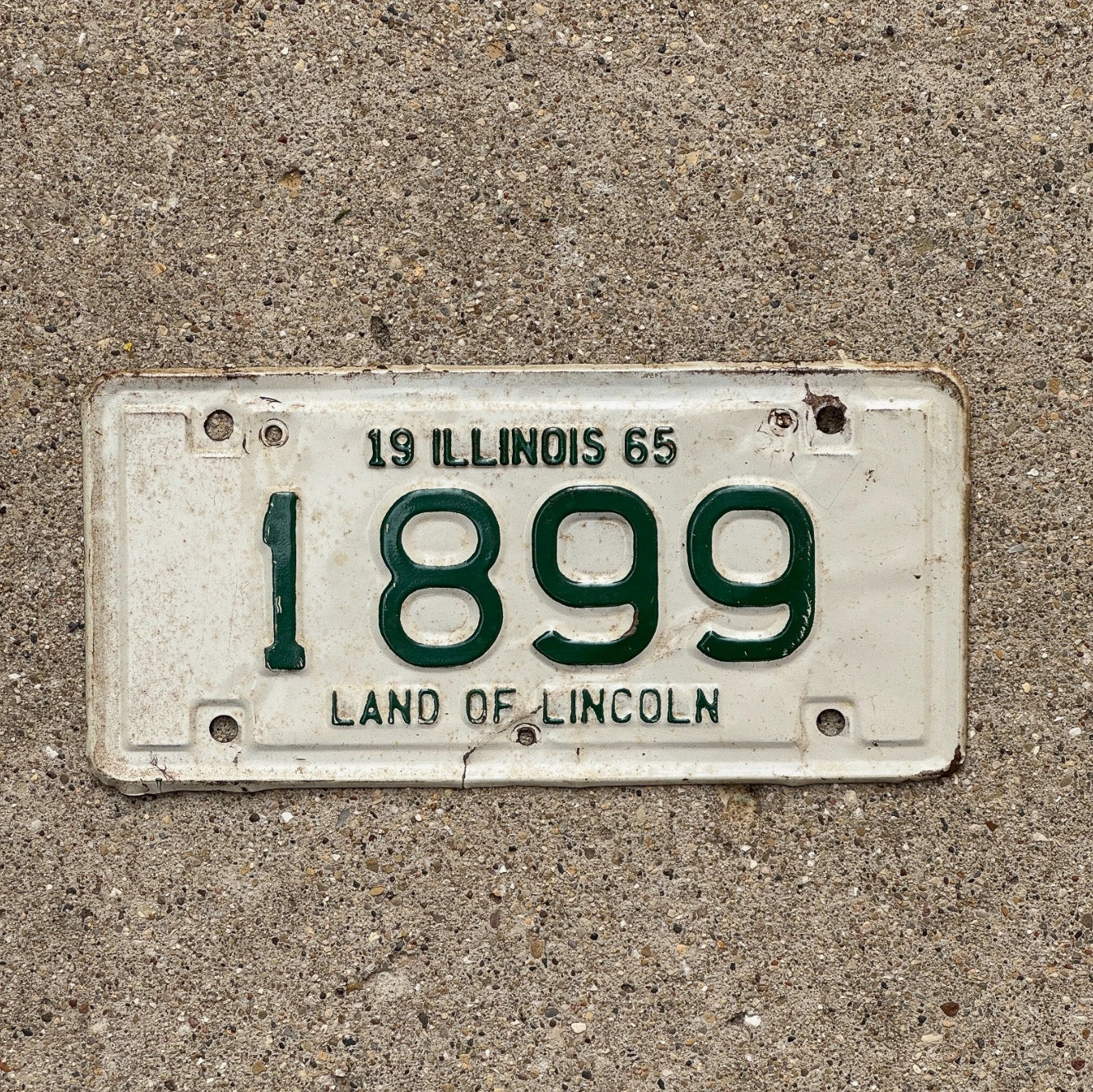Photo of a 1965 Illinois Motorcycle License Plate Auto Tag Garage Decor Vintage 1899 with original patina