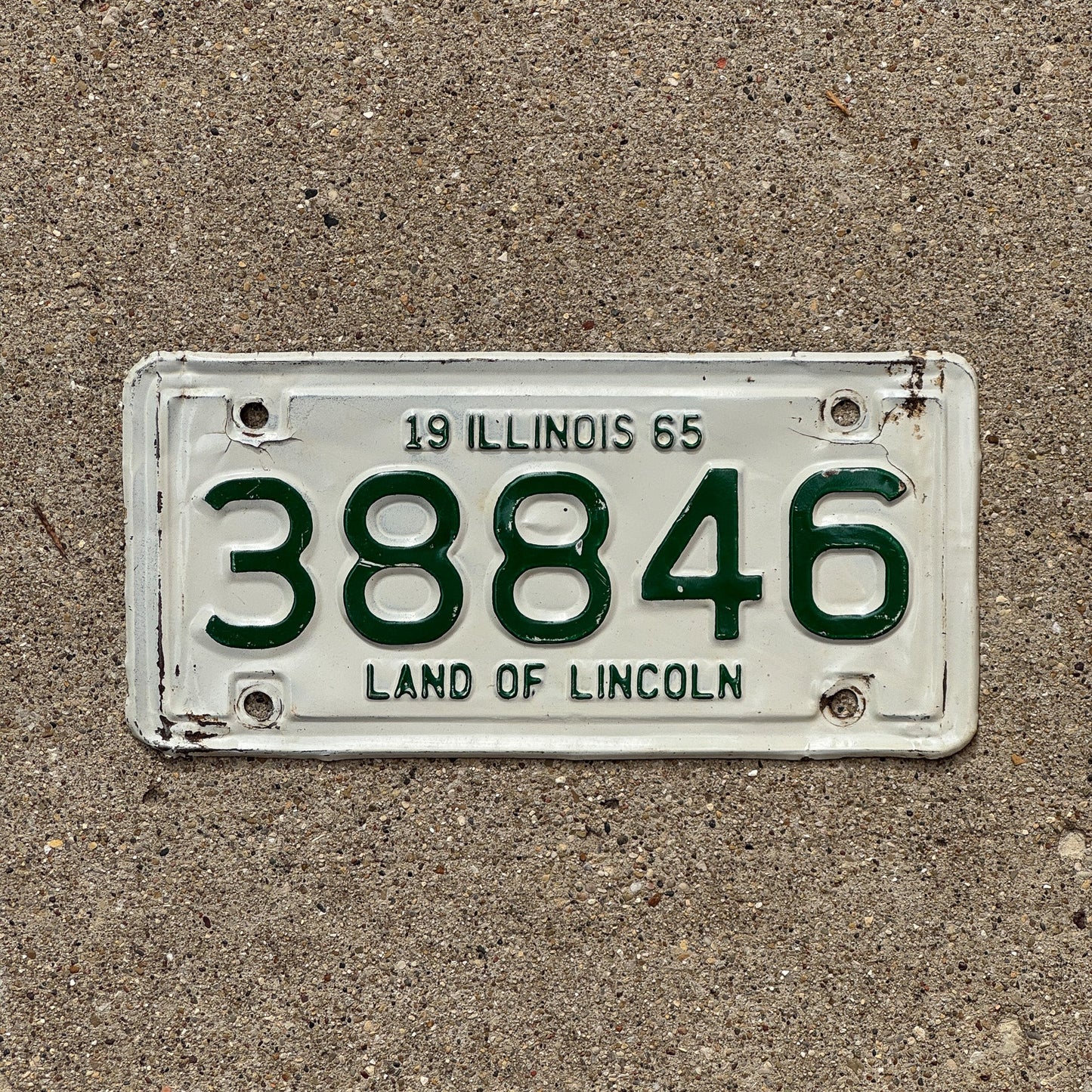 Photo of a 1965 Illinois Motorcycle License Plate Auto Tag Garage Decor Vintage 38846