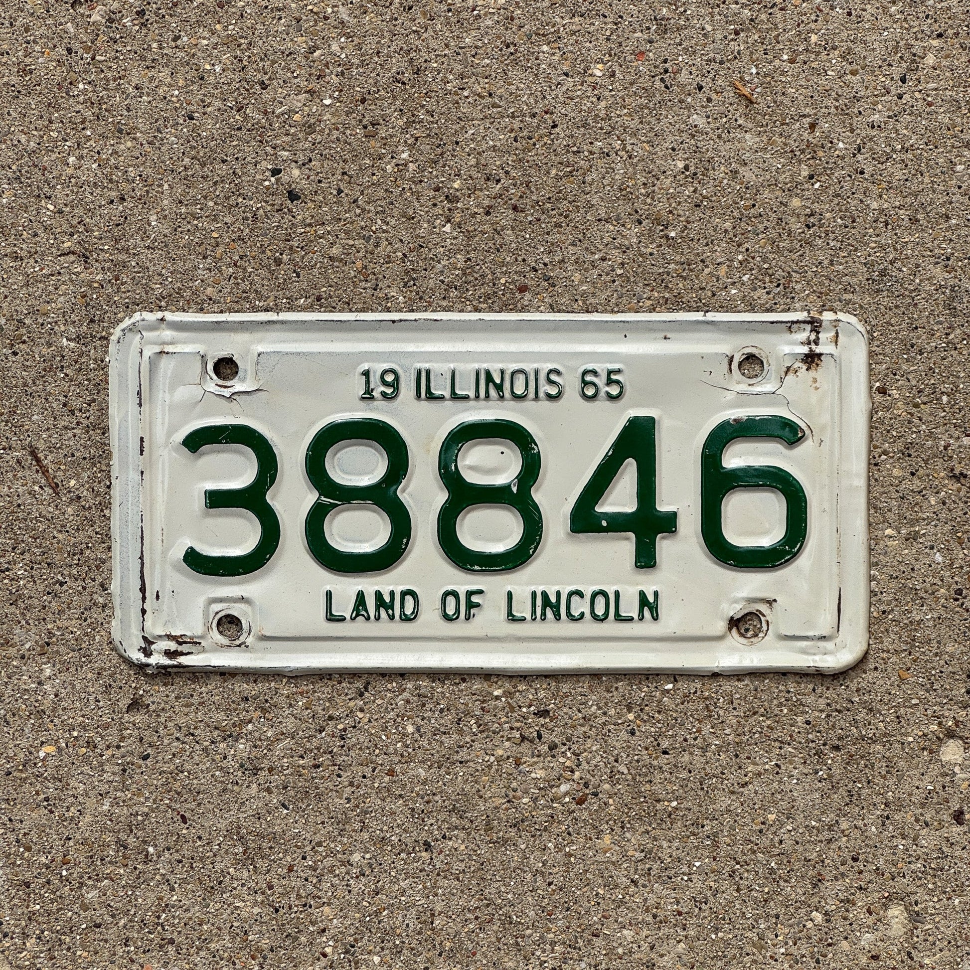 Photo of a 1965 Illinois Motorcycle License Plate Auto Tag Garage Decor Vintage 38846