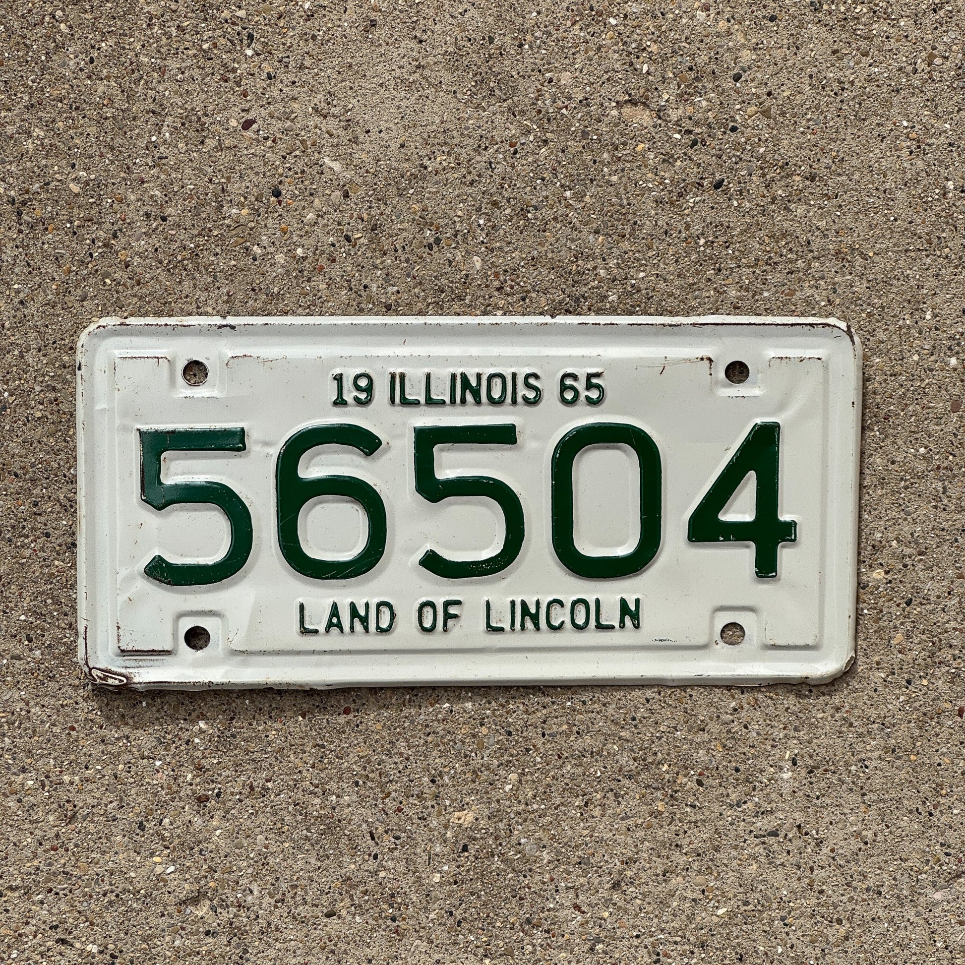 Photo of a 1965 Illinois Motorcycle License Plate Auto Tag Garage Decor Vintage 56504