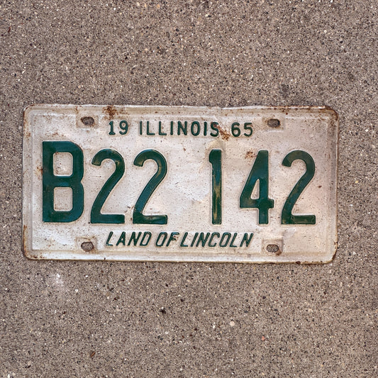 Photo of a 1965 Illinois Truck License Plate Auto Tag Garage Decor Vintage B 22 142 with original patina