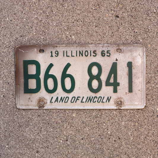 Photo of a 1965 Illinois Truck License Plate Auto Tag Garage Decor Vintage B 66 841 with original patina
