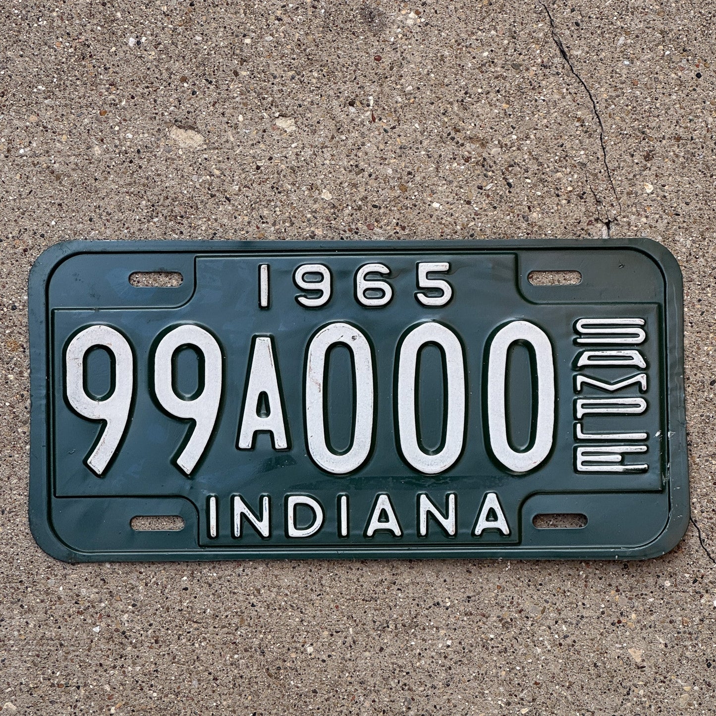 Photo of a 1965 Indiana Sample License Plate Auto Tag 1 Garage Decor 99A000 with original patina