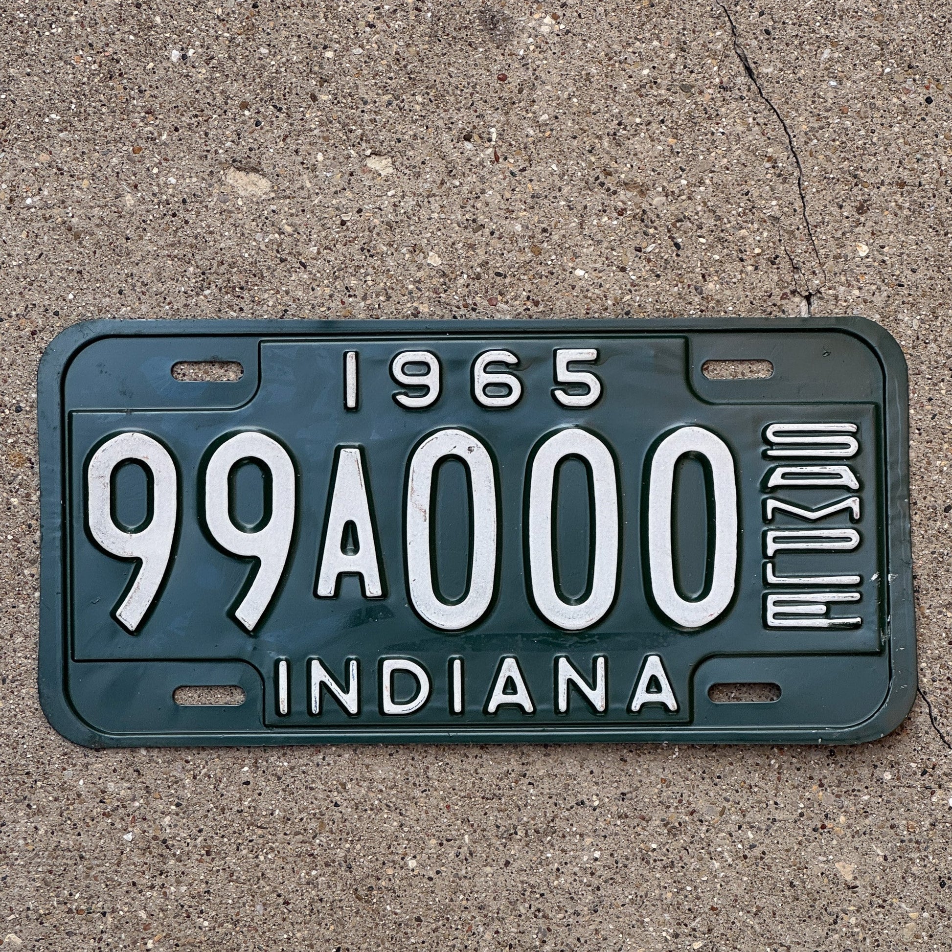 Photo of a 1965 Indiana Sample License Plate Auto Tag 1 Garage Decor 99A000 with original patina