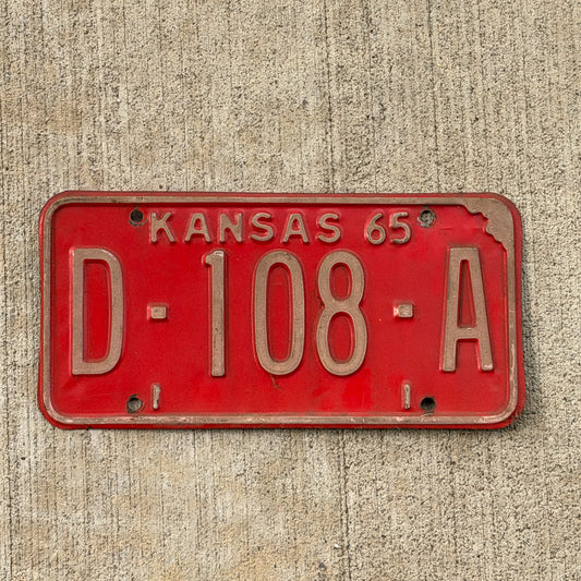 Photo of a 1965 Kansas Dealer License Plate Auto Tag Garage Decor Vintage D 108 A with original patina