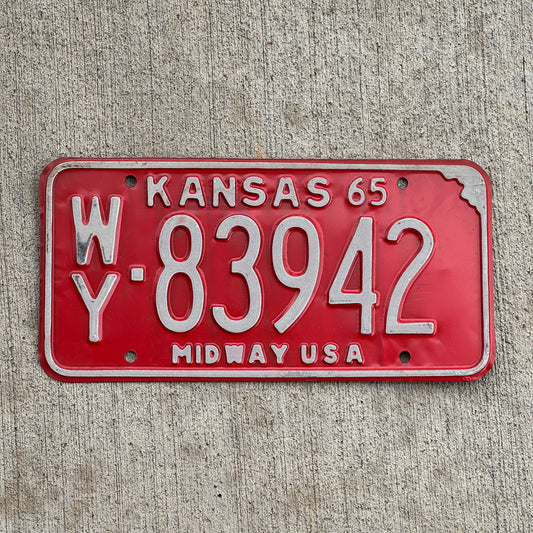Photo of a 1965 Kansas License Plate Auto Tag Garage Decor Vintage WY 83942 with original patina