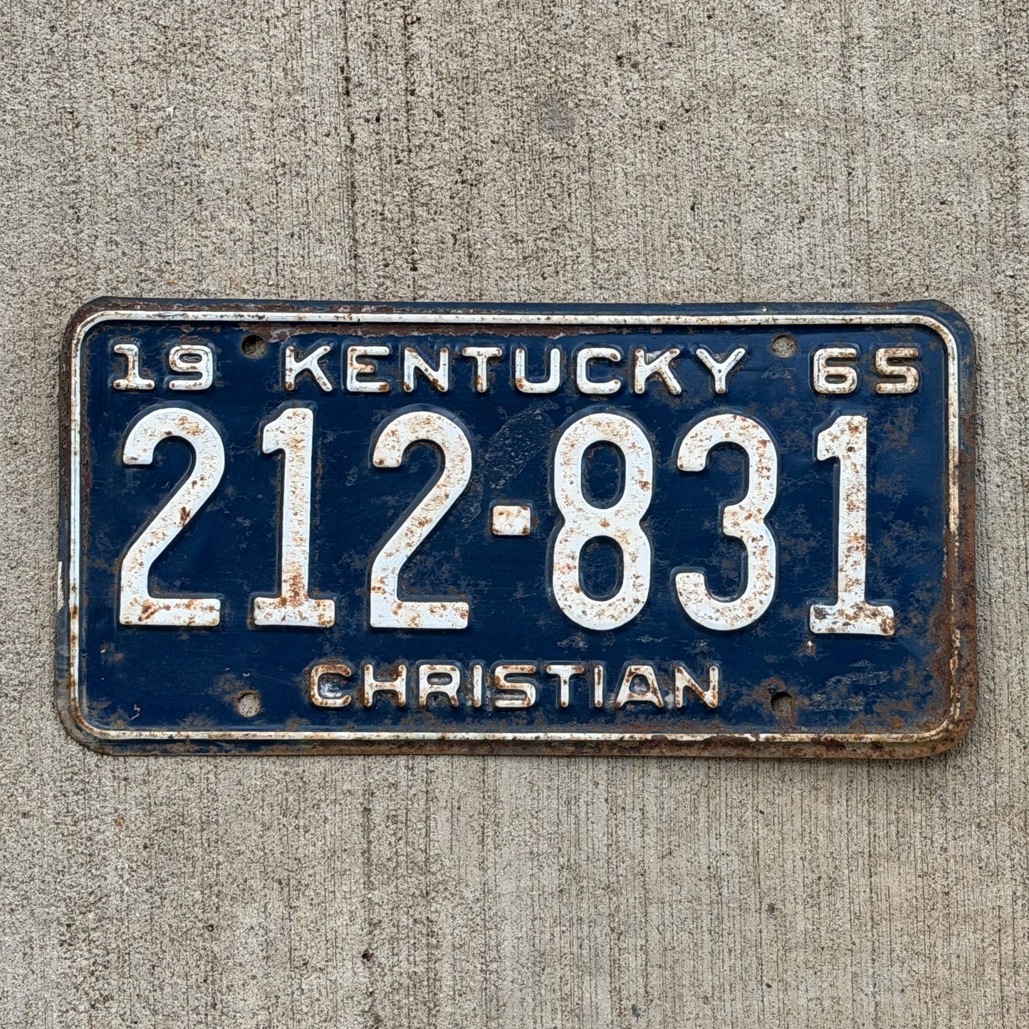 Photo of a 1965 Kentucky License Plate Auto Tag Garage Decor Vintage 212 831 with original patina