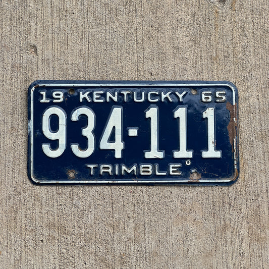 Photo of a 1965 Kentucky License Plate Auto Tag Garage Decor Vintage Repeat Repeating 934 111 with original patina