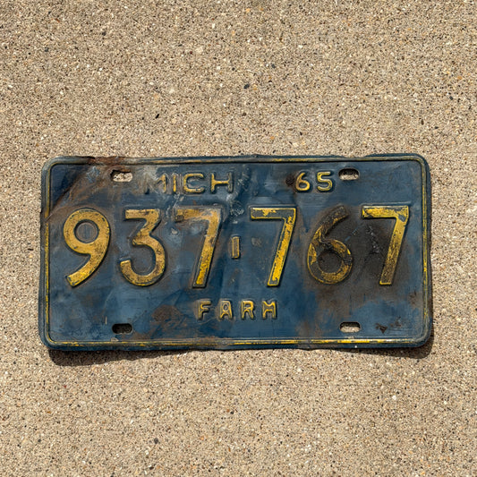 Photo of a 1965 Michigan Farm License Plate Auto Tag Garage Decor Vintage 937 767 with original patina