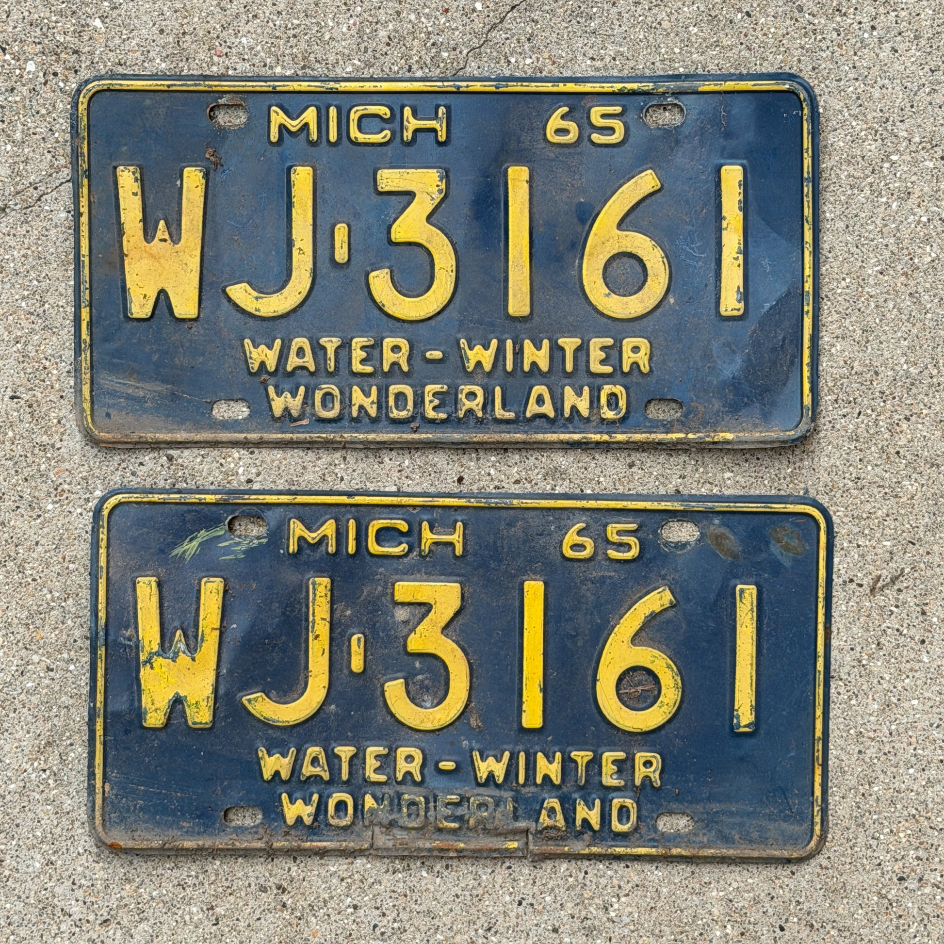 Photo of a 1965 Michigan License Plate Pair Auto Tag Garage Decor Vintage WJ 3161 with original patina