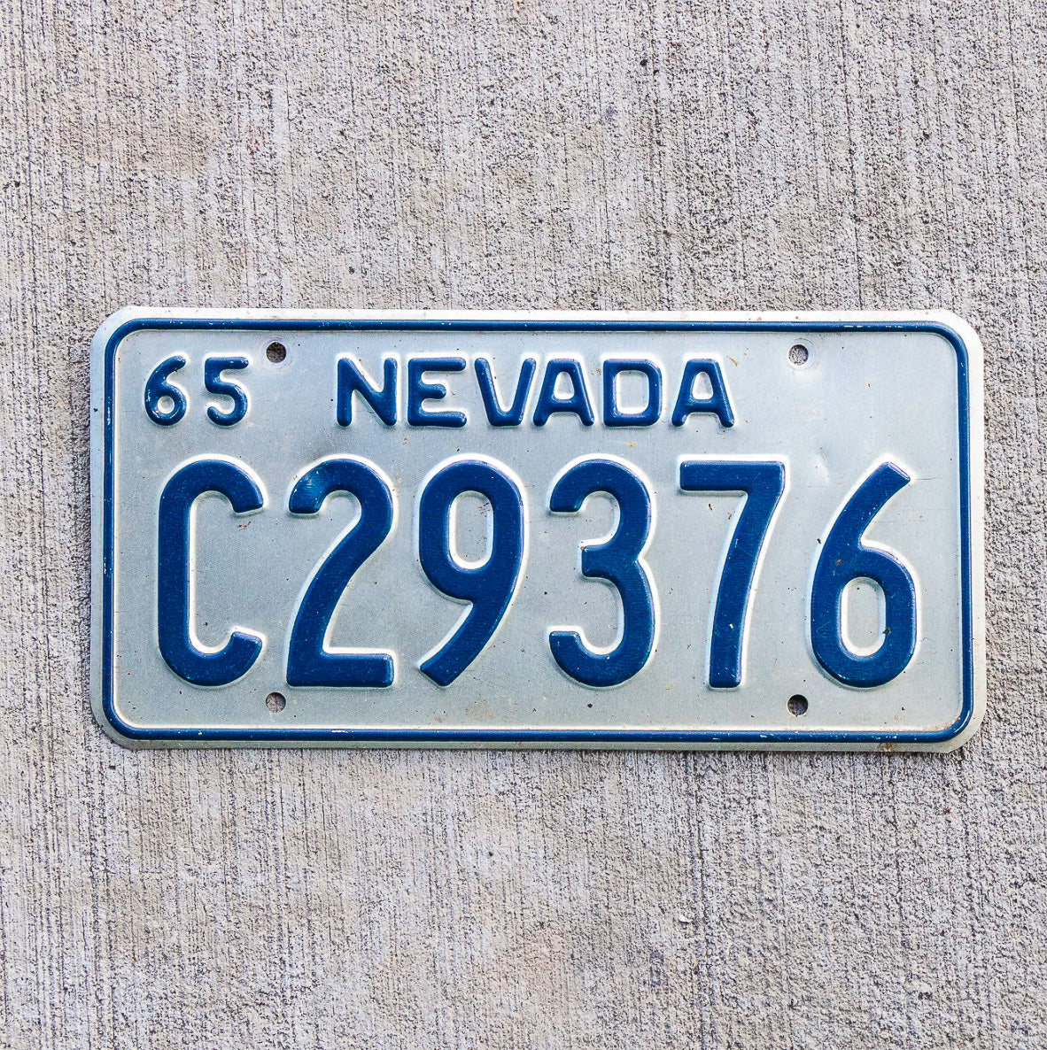 Photo of a 1965 Nevada License Plate Auto Tag Garage Decor Vintage C 29376 with original patina