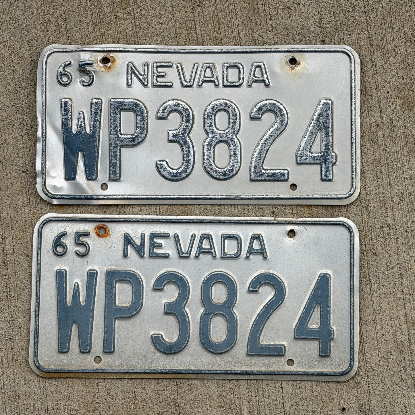 Photo of a 1965 Nevada License Plate Pair Auto Tag Garage Decor Vintage WP 3824 with original patina