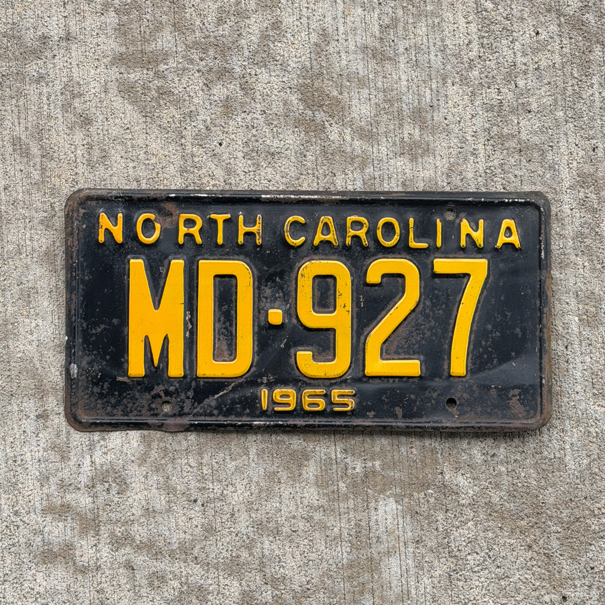 Photo of a 1965 North Carolina License Plate Auto Tag Garage Decor Vintage MD 927 with original patina