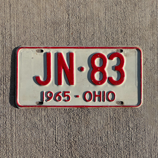 Photo of a 1965 Ohio License Plate Auto Tag Garage Decor Vintage JN 83 with original patina
