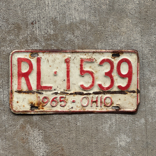 Photo of a 1965 Ohio License Plate Auto Tag Garage Decor Vintage RL 1539 with original patina