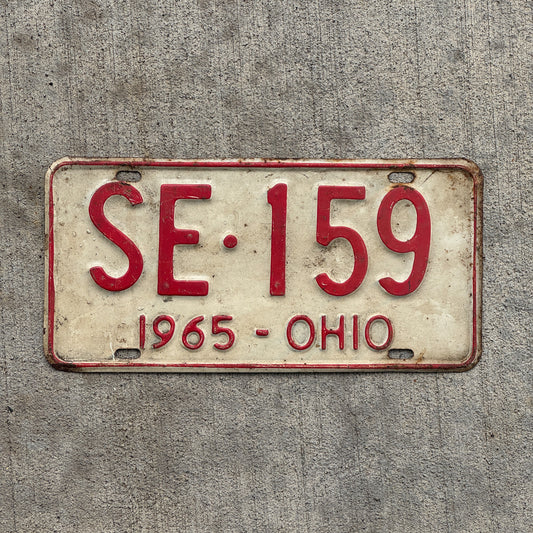 Photo of a 1965 Ohio License Plate Auto Tag Garage Decor Vintage SE 159 with original patina