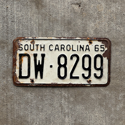 Photo of a 1965 South Carolina License Plate Auto Tag Garage Decor Vintage DW 8299 with original patina