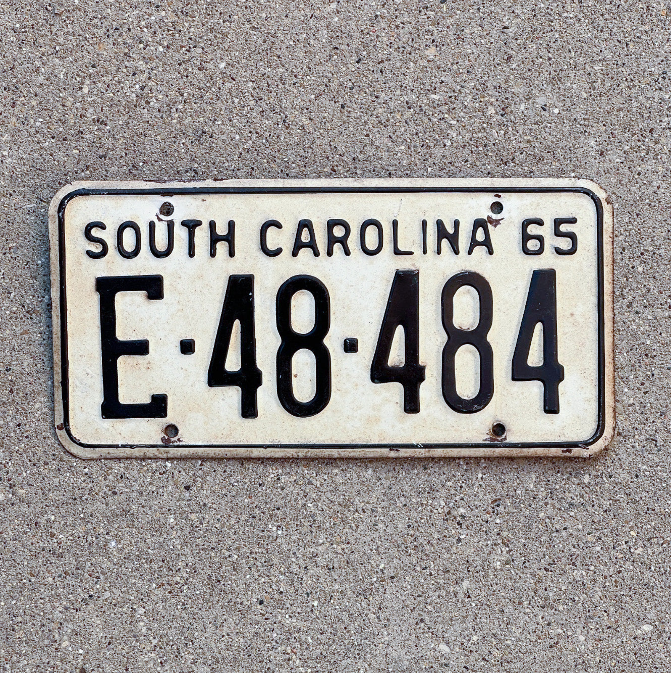 Photo of a 1965 South Carolina License Plate Auto Tag Garage Decor Vintage Palindrome E 48 484 with original patina
