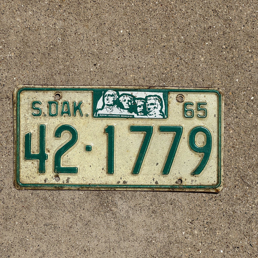 Photo of a 1965 South Dakota License Plate Auto Tag Garage Decor Vintage Kingsbury 42 1779